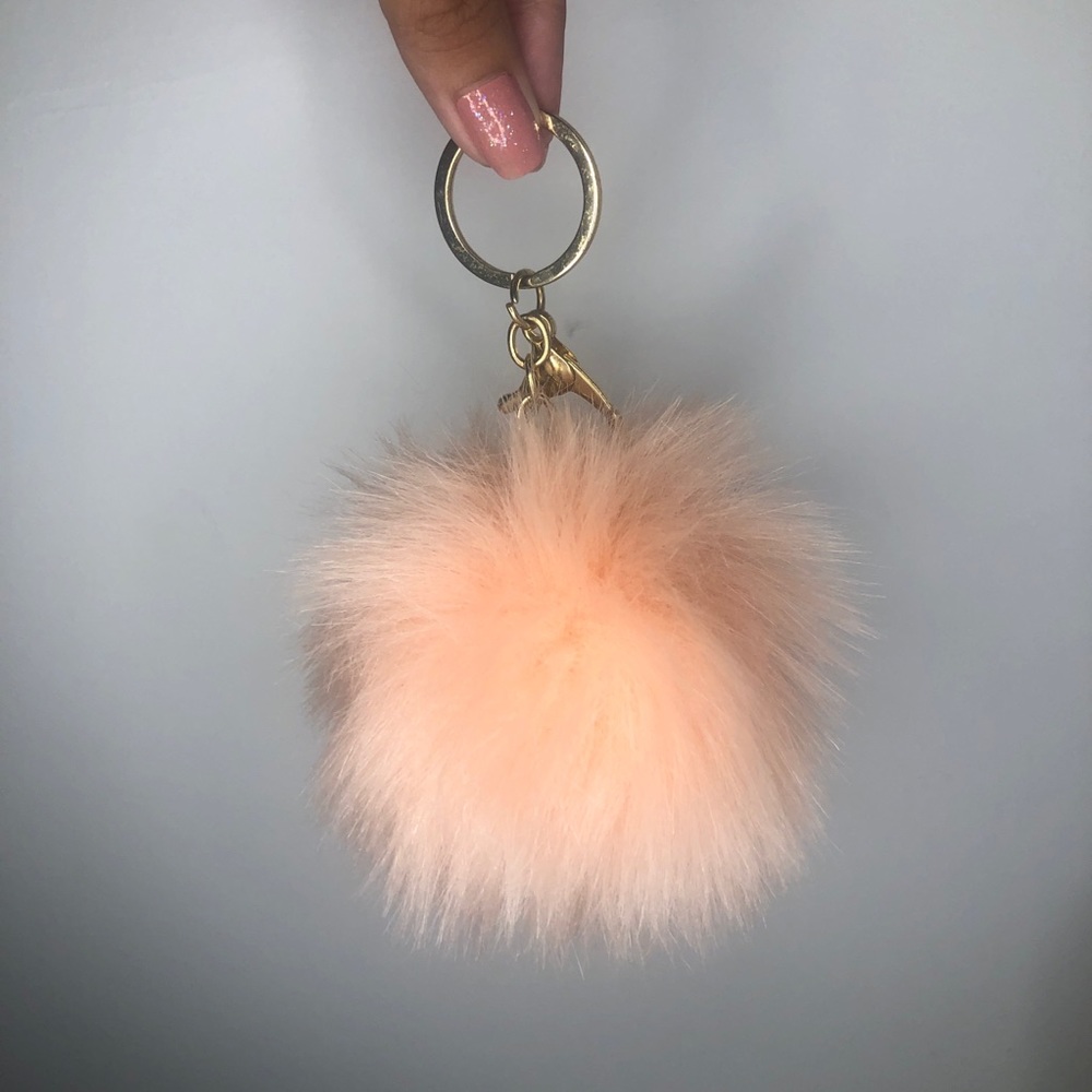 pink and gold puff ball keychain